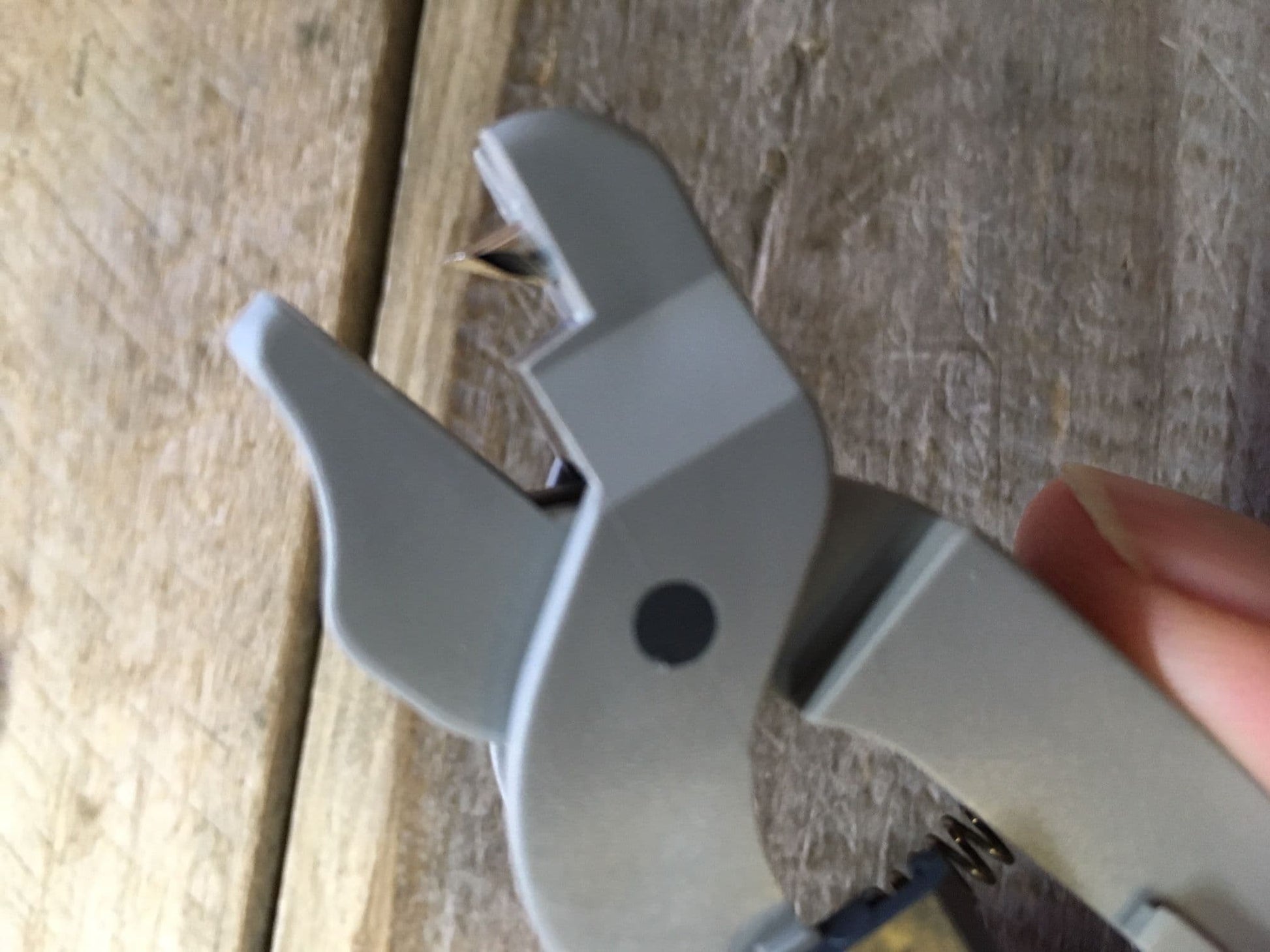 Stonfo fishing shot removal tool in use showing ergonomic design