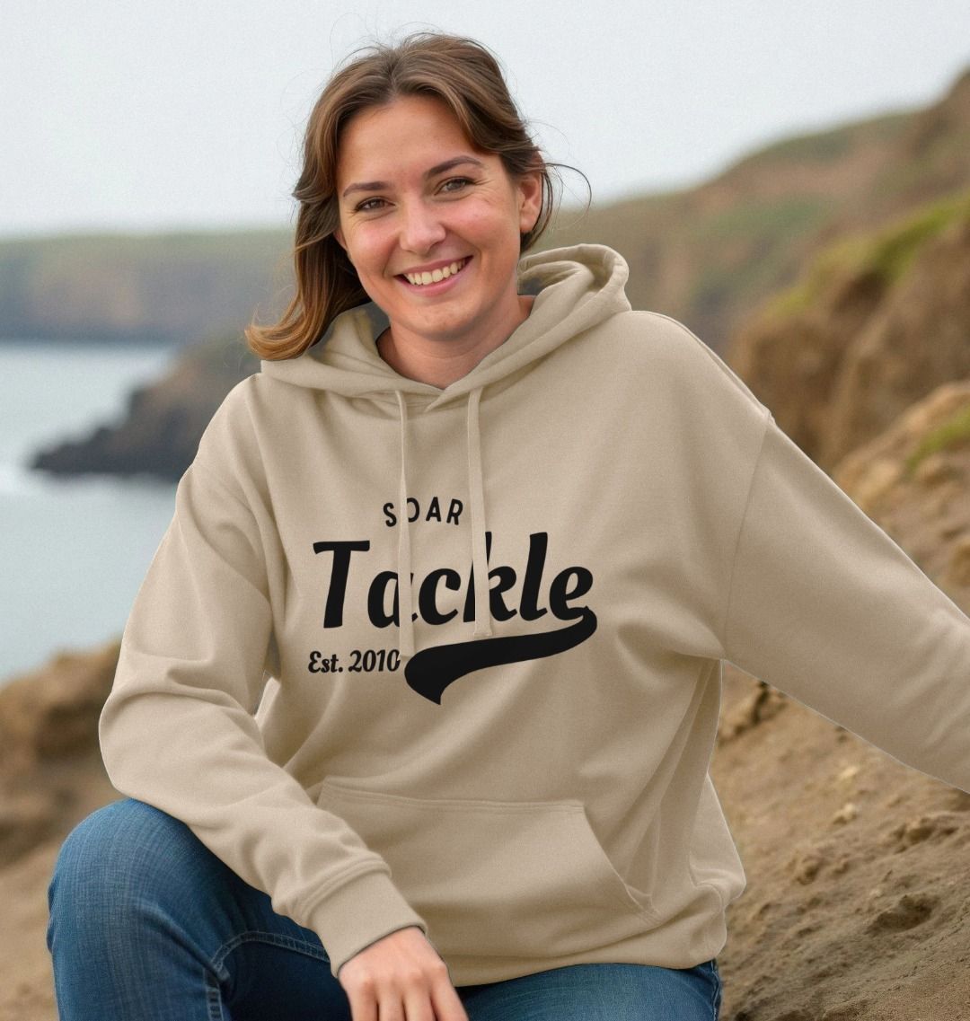 Soar Tackle unisex hoodie in oat colour with retro style logo