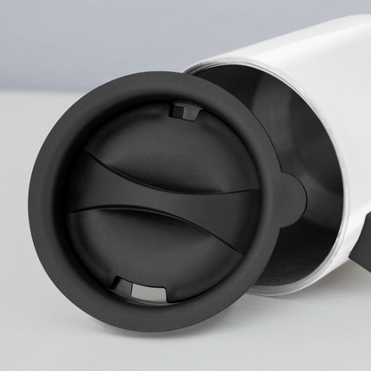 Close-up of a black lid on a stainless steel fishing travel mug for outdoor enthusiasts